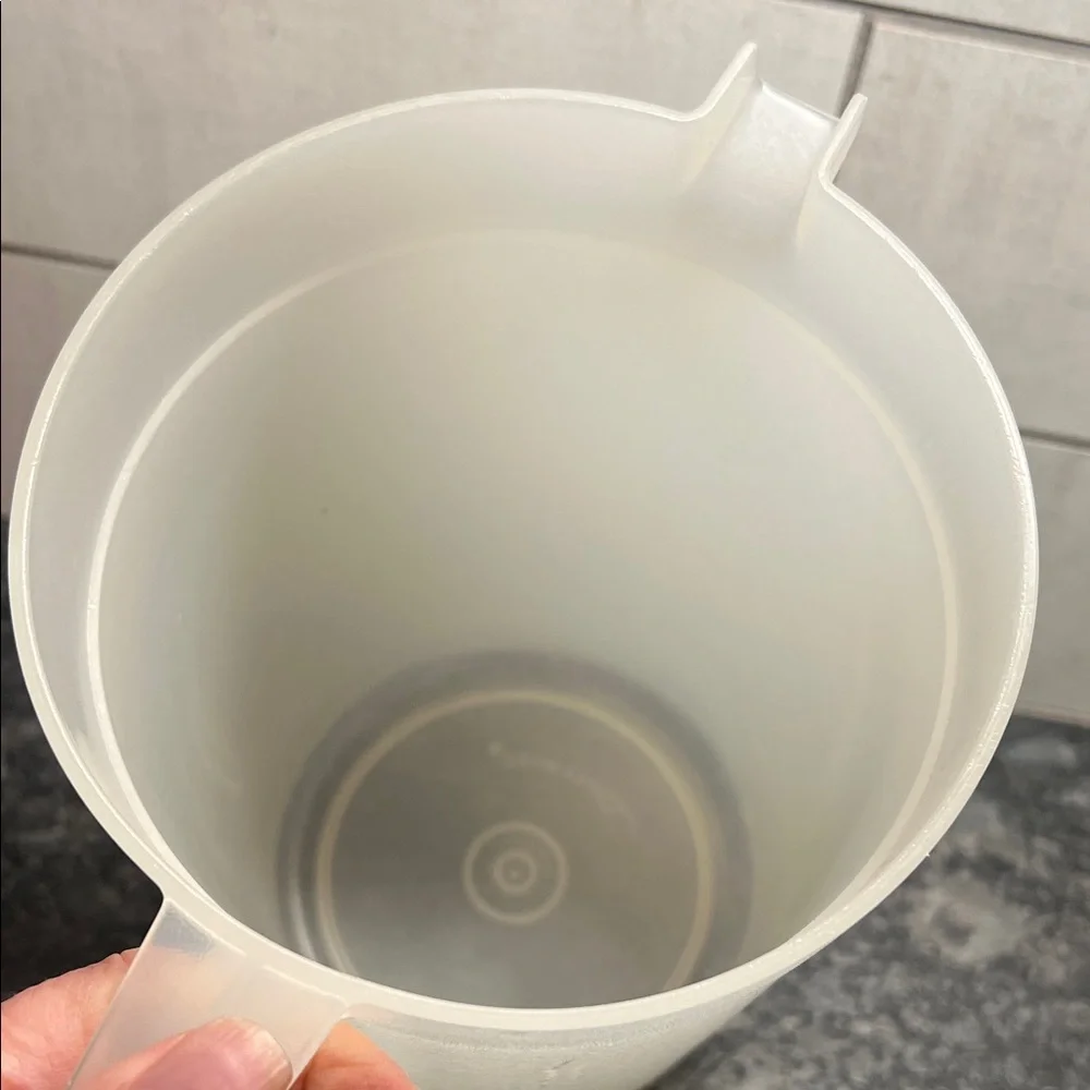 Vintage semi sheer push button Pitcher with Rust Accent. Excellent condition